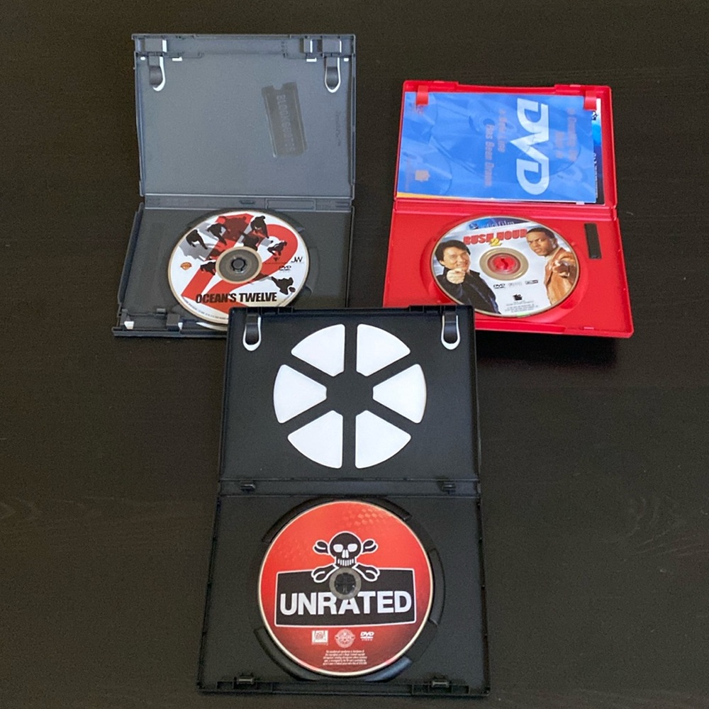 Three blockbuster hit DVDs EUC Dodgeball Oceans Twelve rush and Rush Hoir 2